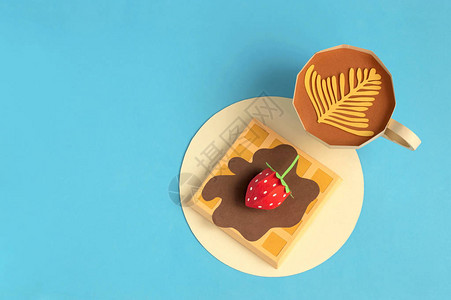 比利时华夫饼配巧克力糖浆和草莓图片