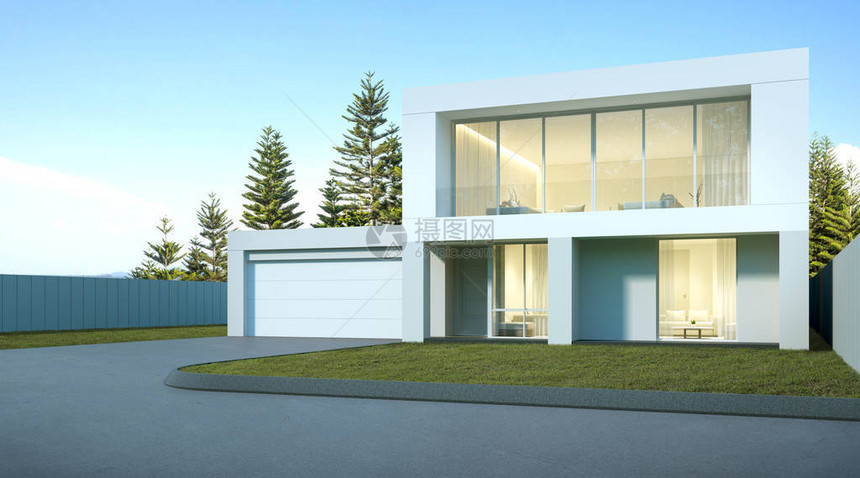 拥有草坪的豪华现代住宅松树背景的车库入口建筑设计理念的视角图片