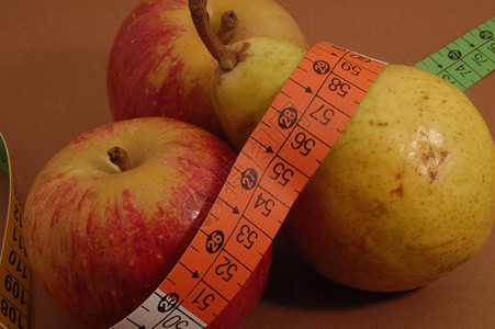 苹果和梨子加上描述肥胖症背景图片