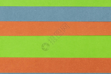 绿色橙色和蓝色彩纸面背景抽象背景图片