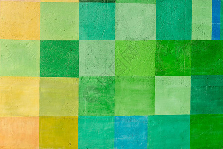 黄色绿色和蓝色方块的杂色背景涂在未图片