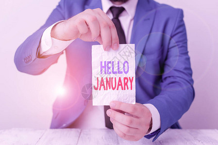 文字书写文本你好一月商务照片展示对今年第一个月的问候或热烈欢迎男人拿着空纸背景图片