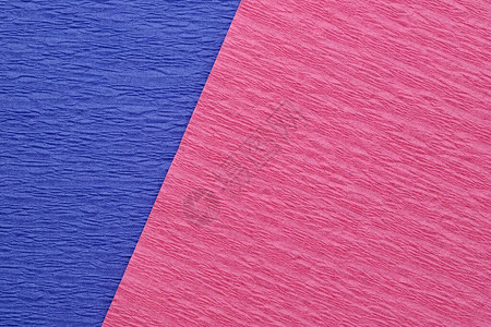 粉色和蓝色纸的粗糙和皱纹理背景背景图片