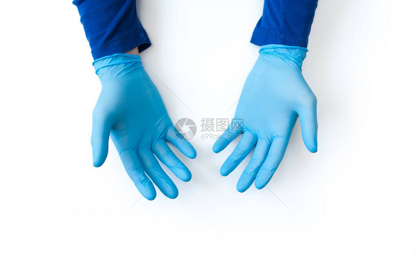 蓝色戴手套的手紧靠白色背景要求手部消毒停止验尸官的概念在隔离期间使用图片