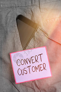 显示转换客户的文本符号商业照片展示营销策略和策略将潜在客户转变为买家智能手机设备在正式工作裤前袋背景图片