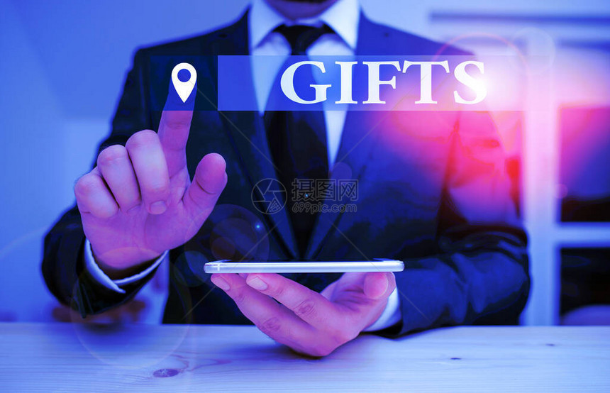 手写文本礼物概念照片是自愿赠送给没有付款或礼物的人东西男穿正装的礼物演示使用高图片