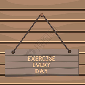 概念手写显示每天锻炼概念意思是大力移动身体以保持健康木板钉彩色背景图片