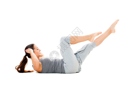 妇女为腹部肌肉进行体力锻炼与图片