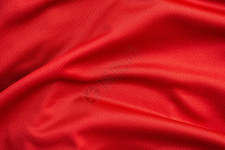 穿红运动服的红运动服装足球图片