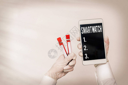 手写文本书写Smartwatch带触摸屏显示的概念照片移动设备图片