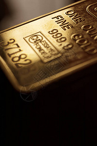 9999一盎司的金块吞噬贵金属背景图片