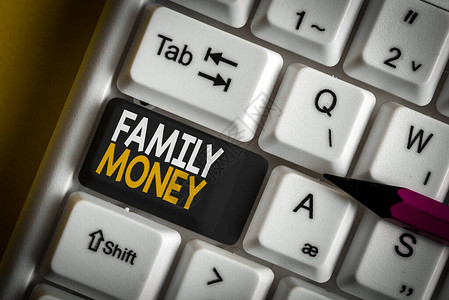 概念手写显示家庭金钱概念意味着已建立的上层家庭的继承财富白色pc键盘图片