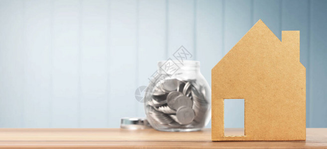 房地产投资和住房抵押房贷金融概念资金硬币堆叠式钱花板图片