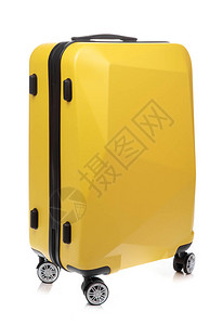白色背景上孤立的黄色旅行袋背景图片
