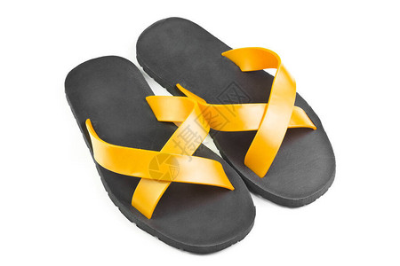 普通凉鞋或黄色和黑色的鞋子图片