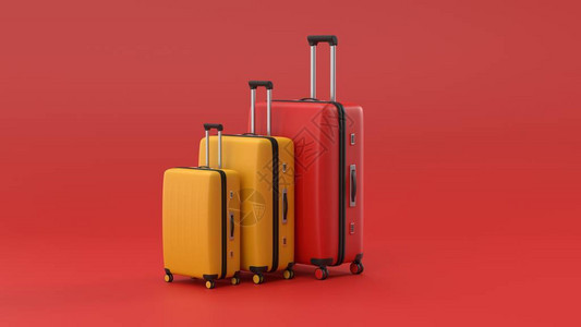 白色背景的黄色和红色手提箱图片