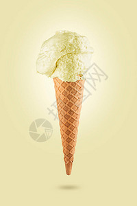 黄色背景中的冰淇淋锥图片