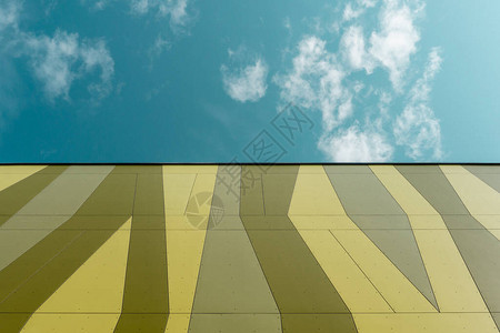 抽象建筑具有不规则形状的彩色装饰外墙面板现代建筑细节复制空间图片