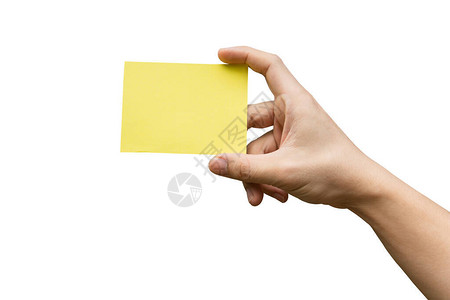 手握黄色纸用剪片拍着白图片