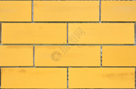 现代黄色砖墙或用于装饰和内外建筑背图片
