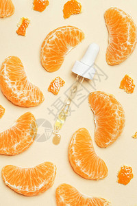 橘子精油滴管吸和橘子片高清图片