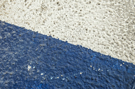 蓝色和白色粒状背景建筑物的墙壁背景图片