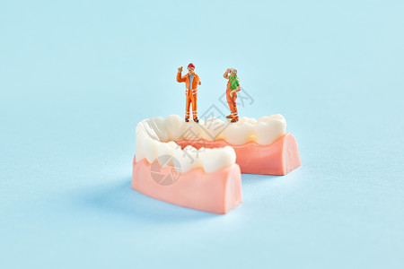 保护牙齿的创意小人背景图片