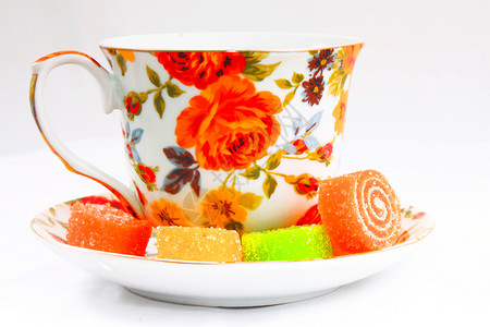 红色和橙色花朵的经典茶杯图片
