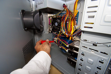 个人计算机内部电源包头板电缆光碟背景图片