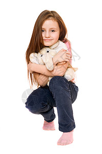 美丽的小女孩带着大象的泰迪小图片