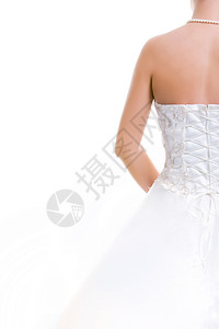 新娘穿着婚纱的背面照片在白色背景图片