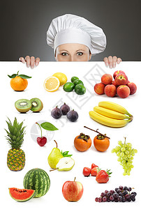 看着水果收集广告牌的女厨师图片