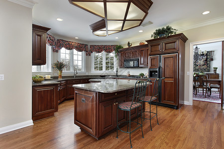 现代家居中的厨房配有花岗岩台面图片
