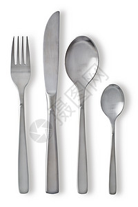 白色背景上带有叉子刀子和勺子的餐具图片