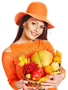 女人拿着水果蔬菜的秋天篮图片