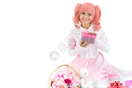 粉红开幕礼物中一个快乐的生日女图片