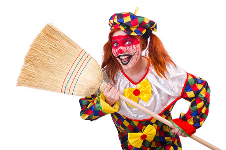 小丑用扫帚上白色孤立图片