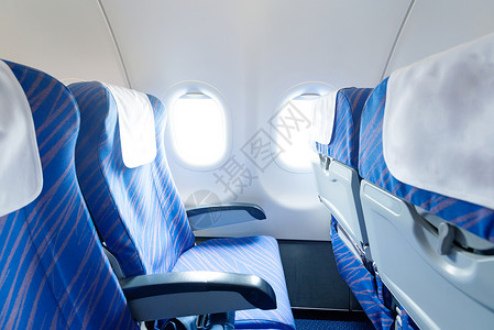 空的飞机座位和窗户游客高清图片素材