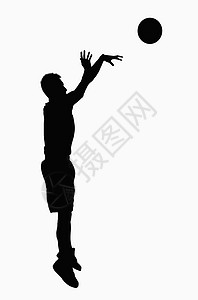 篮球运动员跳跃的剪影图片