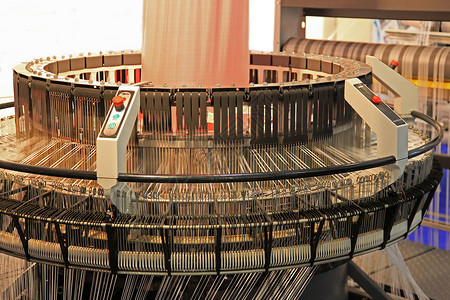 纺织业一家纺织厂在旋转背景图片