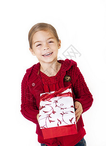 小女孩带着她的圣诞礼物图片