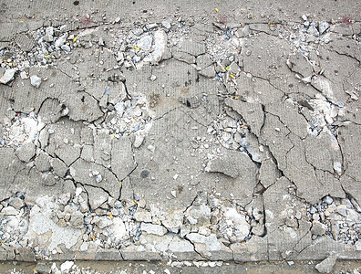 水泥碎裂地面破坏道路的建造图片