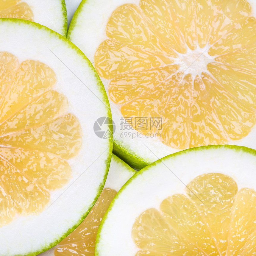 橙色葡萄柚片的背景图片