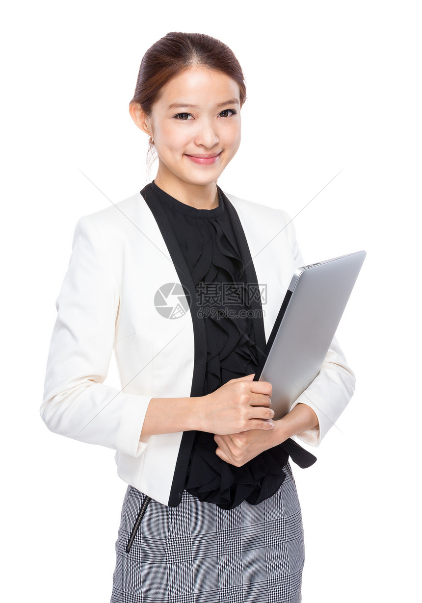 年轻的亚洲女商人笔记本电脑在图片