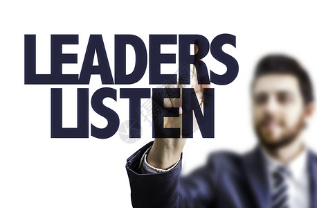 领导者们聆听领导人们倾听在文字上指着图片