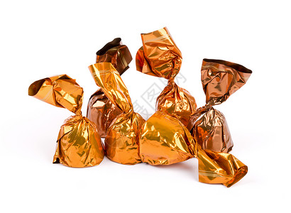 一组巧克力糖盒包在白色隔背景图片