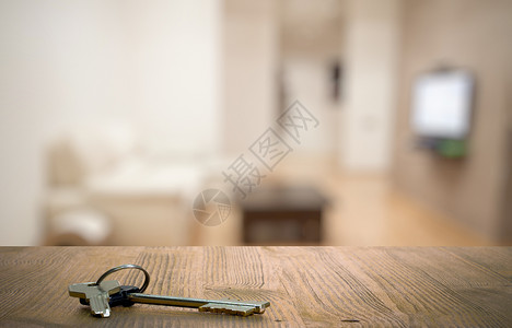 客厅木桌上的钥匙背景图片