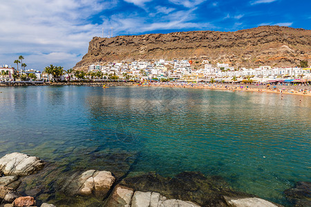 海滩和传统白色建筑西班牙加那利群岛大加图片