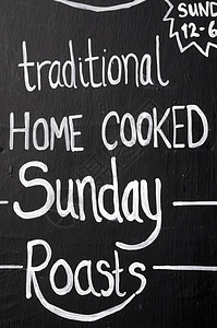 周日煮熟的老家烤肉纸板背景图片