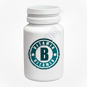一瓶白色背景的维生素B药丸图片